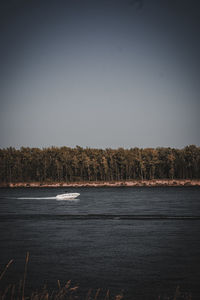 Scenic view of lake against clear sky