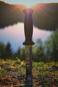 Close-up of cross on field