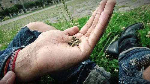 Close-up of hand holding hands