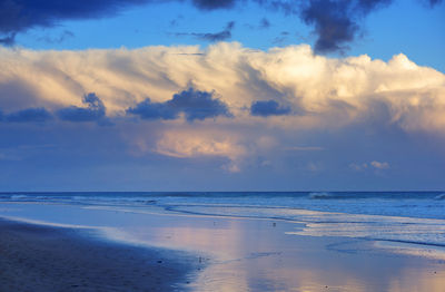 Scenic view of calm sea against sky