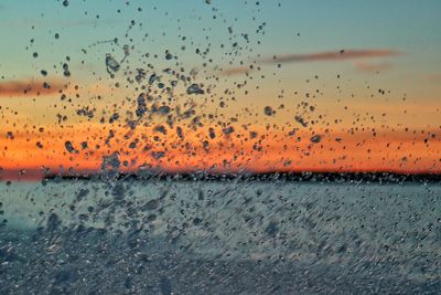 Scenic view of sea at sunset