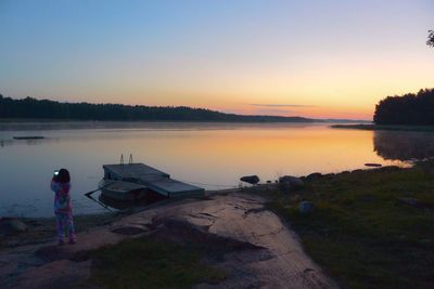 Scenic view of sea at sunset