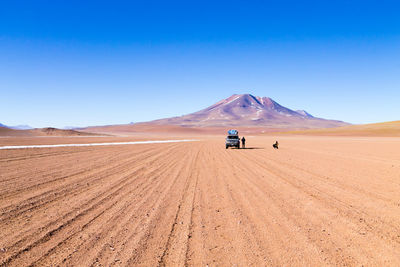 Scenic view of desert against clear sky