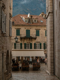 People in front of historic building