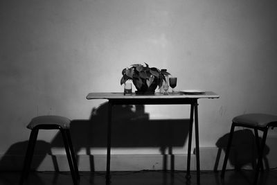 Empty chairs and tables in living room