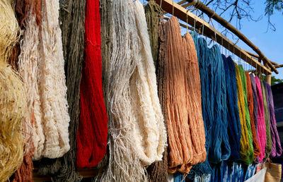 Close-up of clothes drying for sale in market