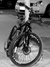 Close-up of bicycle on road