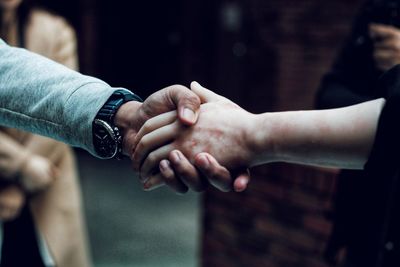 Close-up of hand holding hands