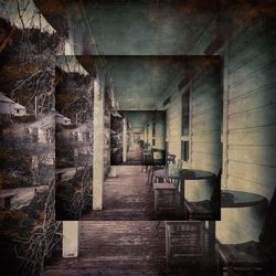 Empty alley along built structures