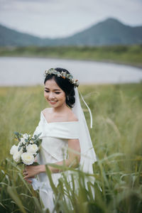 Woman smiling on field