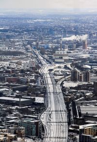 High angle view of city street against sky