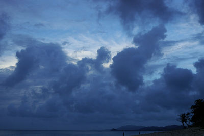 Low angle view of storm clouds over sea