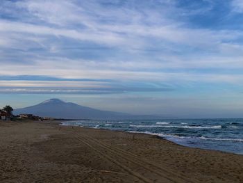 Scenic view of beach against sky