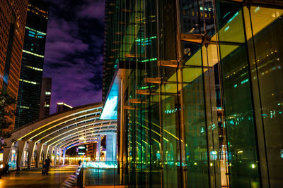 Low angle view of illuminated city at night