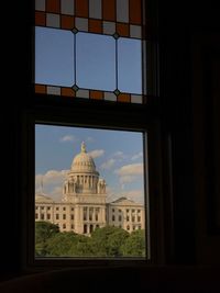 Buildings seen through window