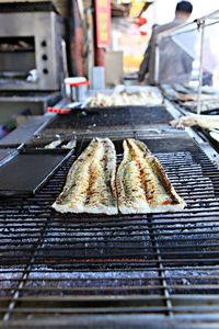 Close-up of meat on barbecue grill