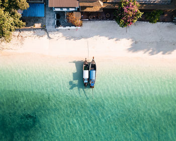 Aerial view of long tail boat