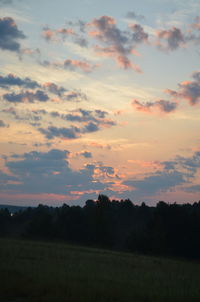 Scenic view of silhouette landscape against sky during sunset