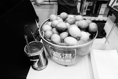 High angle view of potatoes in container on table