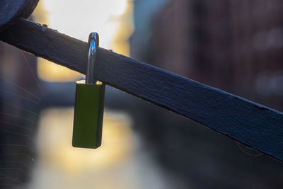 Close-up of metal fence against blurred background