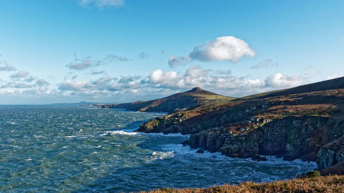 Scenic view of sea against blue sky