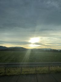 Scenic view of landscape against sky during sunset