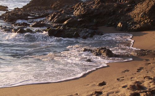 High angle view of wave moving towards shore at laguna beach