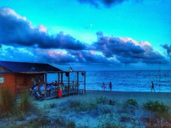 Scenic view of sea against cloudy sky
