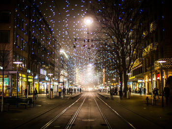 Illuminated street light at night
