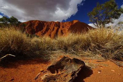 Rock formations on landscape against sky