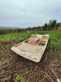 Old ruin on field against sky