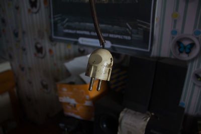 Close-up of padlocks hanging on old metal