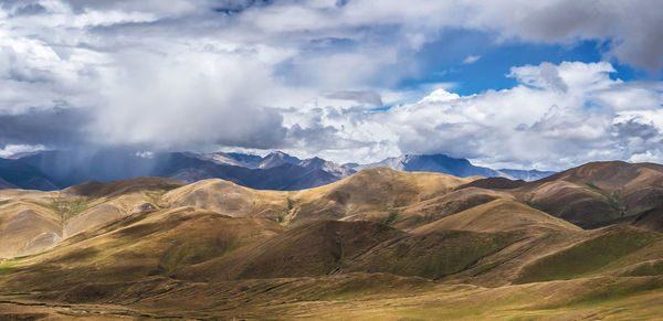 Panoramic view of landscape and mountains against sky