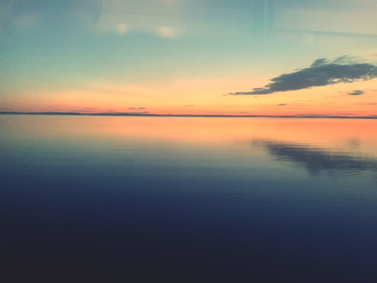 SCENIC VIEW OF SEA DURING SUNSET