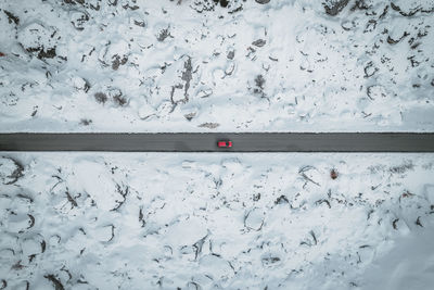 High angle view of snow covered road