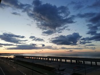 Scenic view of bridge against sky during sunset