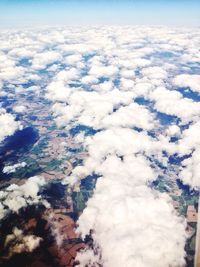 Aerial view of landscape against cloudy sky