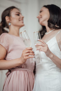 Young woman drinking glasses