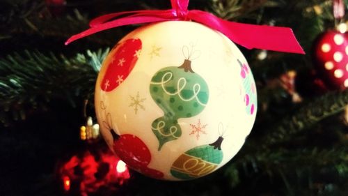 Close-up of christmas decoration hanging on tree