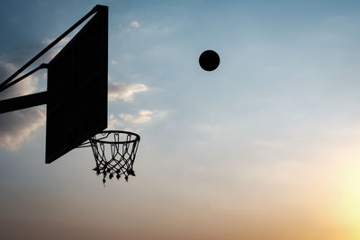 Low angle view of basketball hoop against sky