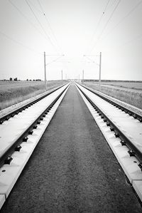 Railroad tracks against sky