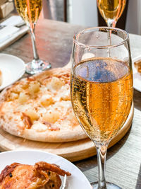 Close-up of wine in glass on table