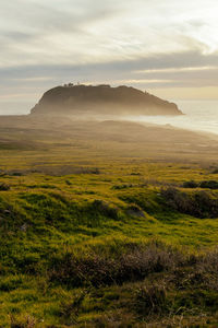 Scenic view of landscape against sky during sunset