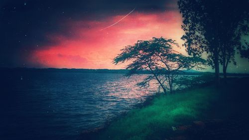 Scenic view of sea against sky at sunset