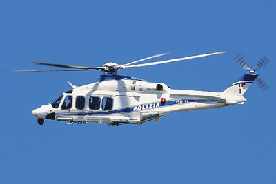 Low angle view of airplane flying against clear blue sky