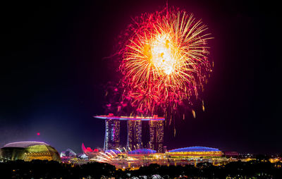 Firework display at night