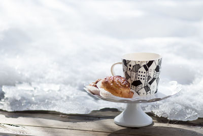 Close-up of dessert on snow