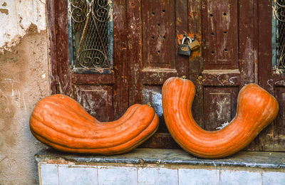 Close-up of squashes on window sill