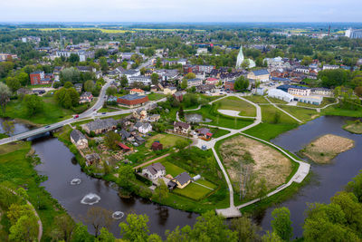 High angle view of buildings and road in city