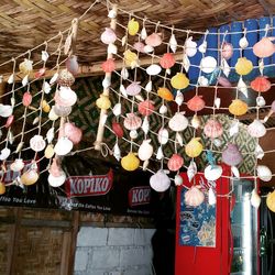 Low angle view of lanterns hanging in store